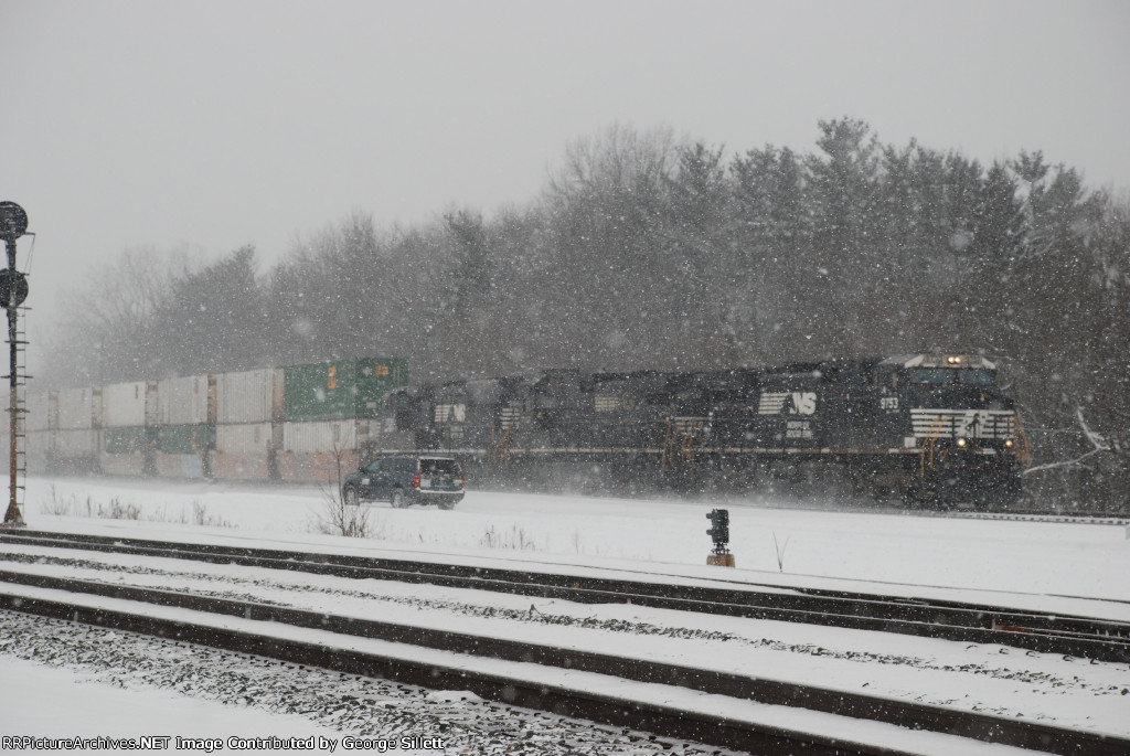 NS 9753 takes another intermodel through the blowing snow.